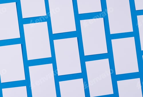 Preview: White business cards with copy space on blue background