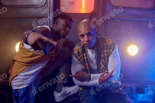 Preview: Cool young guys rappers shooting video in misty subway underground