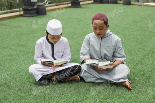 Preview: Two muslim brother reading Koran