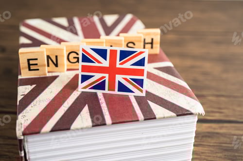 Preview: Word English on book with United Kingdom flag, learning English language courses concept.