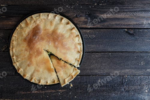 Preview: Greek Pie Spanakopita with Spinach and Cheese, top view, copy space.