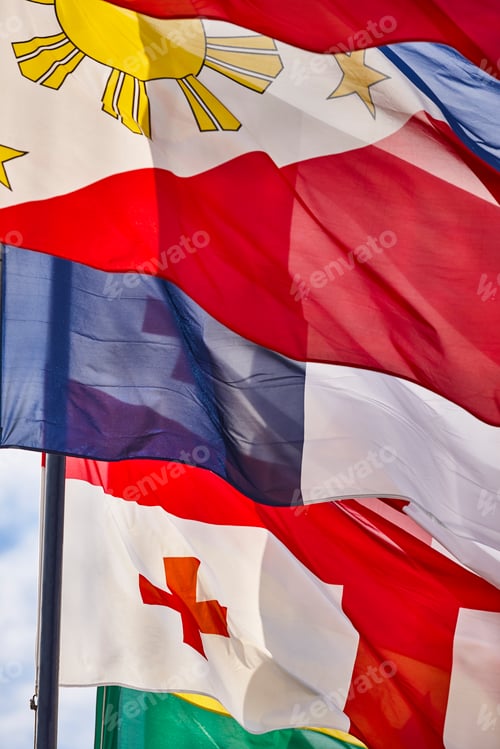 Preview: Vibrant Flags in Wind: Red, White, Blue