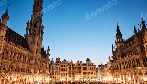 Preview: Grand Place with people at evening