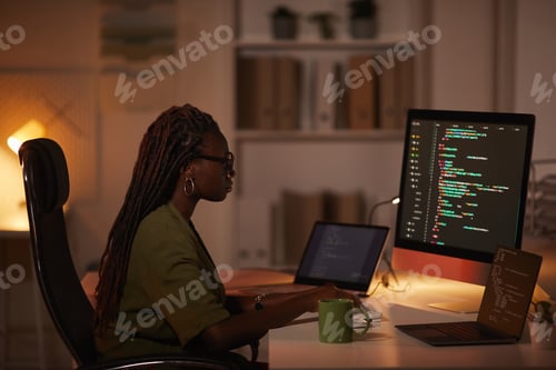 Preview: African-American Woman Writing Computer Code