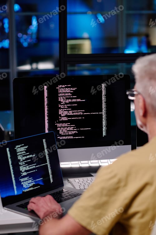 Preview: Close-up of experienced male IT engineer using new software