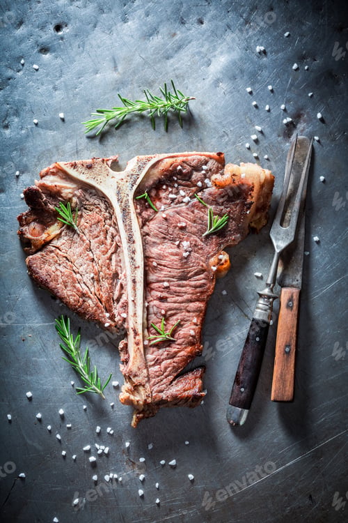Preview: Fresh roasted tbone steak with salt and rosemary