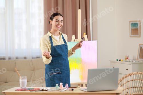 Preview: Teacher conducting online painting lesson at home. Time for hobby