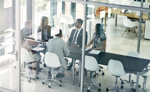 Preview: Presenting ideas to the team. Shot of corporate businesspeople meeting in the boardroom.