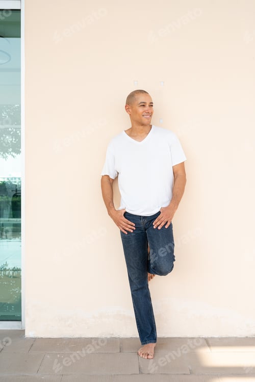 Preview: Portrait of handsome bald man wearing t-shirt