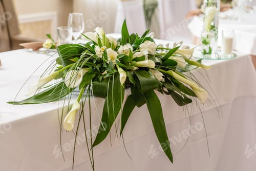 Preview: Beautiful decoration of the wedding holiday with flowers and greenery with florist decoration