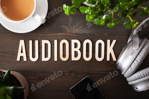 Preview: audiobook word text concept modern wireless headphones smartphone