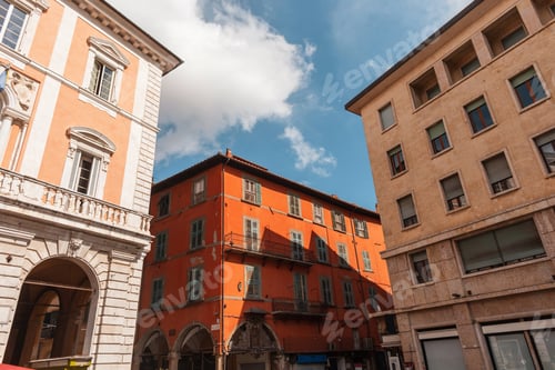 Preview: Ancient street with beautiful colored buildings in Pisa, Italy. Travel and vacations in Italy.