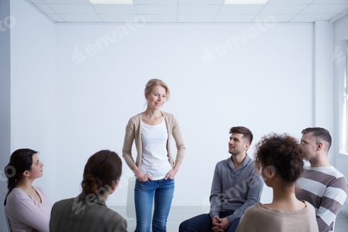 Preview: Woman talking during group therapy