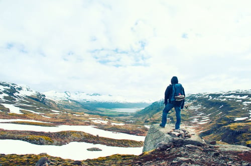 Preview: tourist man top of mountain with backpack