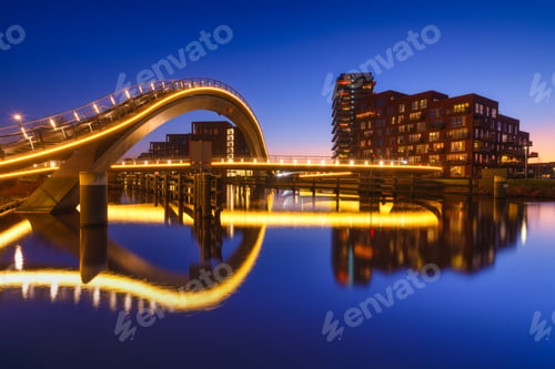 Preview: A bridge in the city at night. City lights. The Galaxy Bridge, Purmerend, Netherlands.