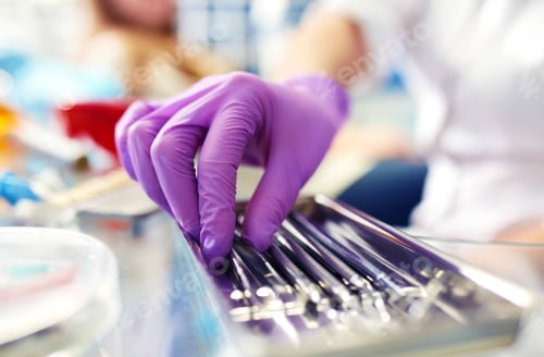 Preview: dental instruments. Dental tools in your hand. Professional woman dentist doctor working.