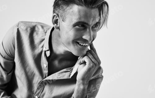 Preview: beautiful gentleman in a shirt on a light background gray photograph model