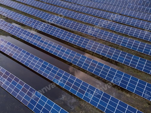 Preview: Aerial view of solar power station in the field for generation power from sun.