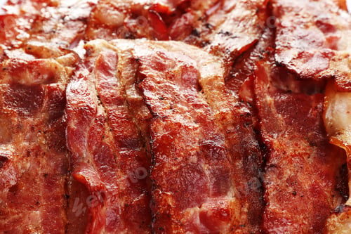 Preview: Slices of tasty fried bacon as background, closeup
