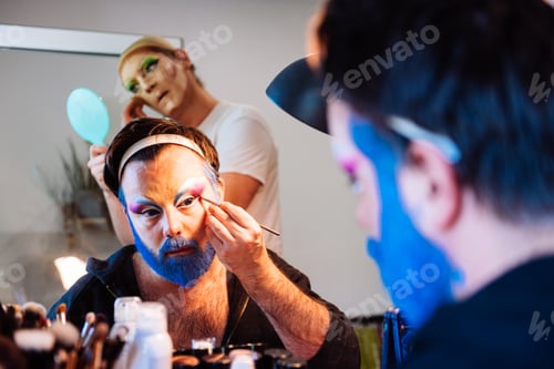 Preview: Men dressing up as drag queens in studio