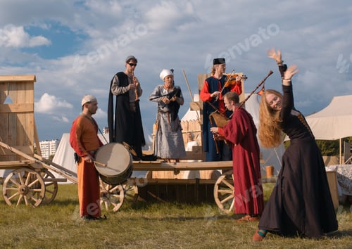 Preview: Folk musicians and woman dancer