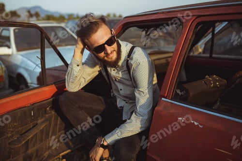 Preview: Young handsome stylish man, wearing shirt and bow-tie with old c