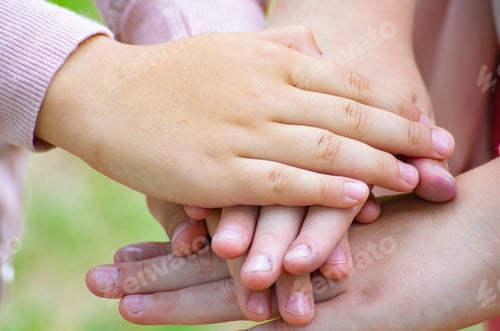 Preview: children hold each other's hands, arms folded symbolizing unity