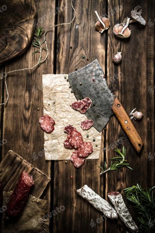 Preview: Salami with an old hatchet, and different spices.