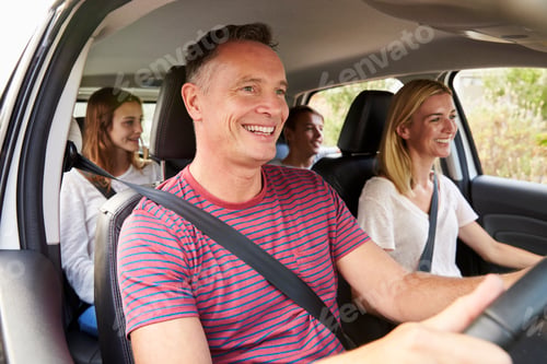 Preview: Family With Teenage Children In Car On Road Trip