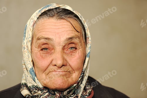 Preview: Closeup Portrait Of Elderly Serious Woman, Age Between 60 And 70