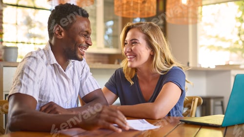 Preview: Excited Couple Opening Letter With Good News At Home
