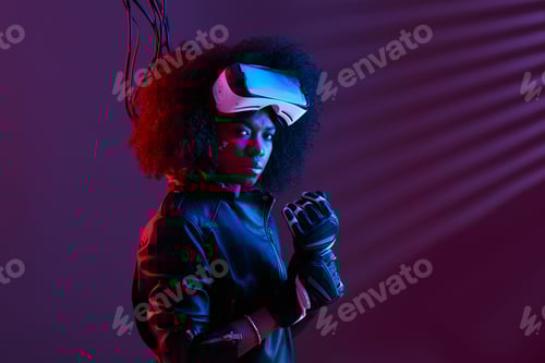 Preview: Stylish curly dark haired girl dressed in black leather jacket and gloves is wearing the virtual