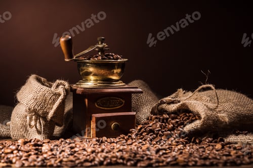 Preview: vintage coffee grinder with sacks of coffee on dark brown background