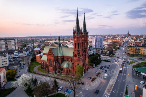 Preview: Holy Family Cathedral Church in Tarnow, Poland. Skyline of City Illuminated at Dusk.