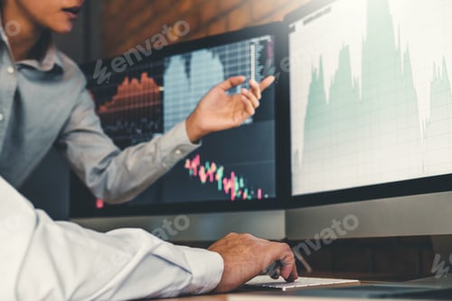 Preview: Investment stock market Entrepreneur Business Man discussing and analysis graph stock market