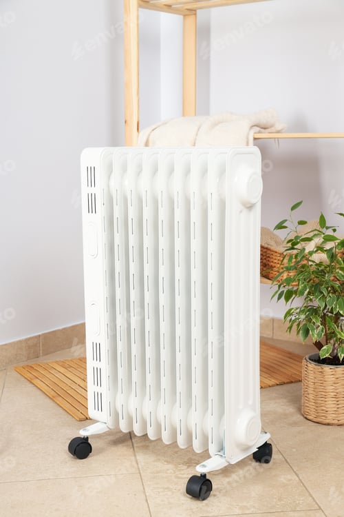 Preview: Concept of heating season, modern electric heater in room