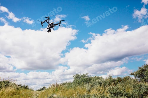 Preview: Drone flying over field