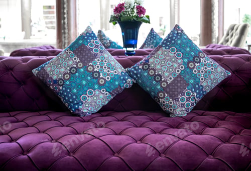 Preview: Purple velvet fabric modern sofa with sunken buttons and colorful decorative pillows.