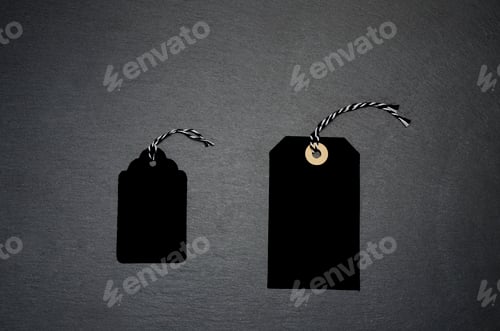 Preview: Two Black Tags on a Dark Gray Surface