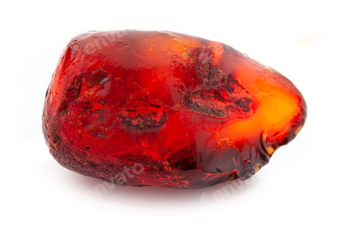 Preview: Natural amber. A piece of yellow opaque natural amber on white background