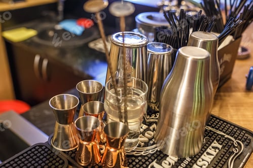 Preview: GRODNO, BELARUS, MAY 2018: metal cups for making cocktails in an elite nightclub bar