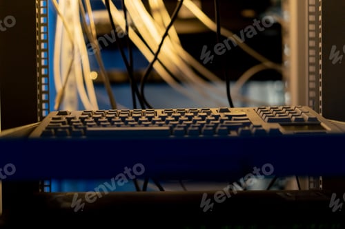 Preview: close-up keyboard in software system data center vulnerable cyber security server room technology