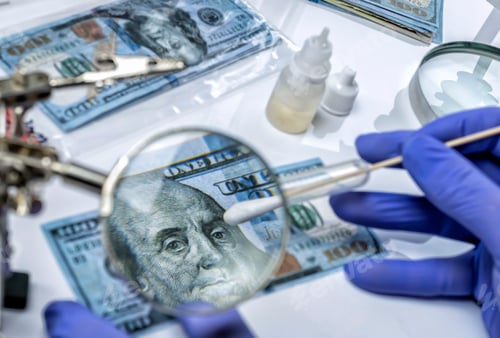 Preview: Police scientist investigates fake dollar bills and passports