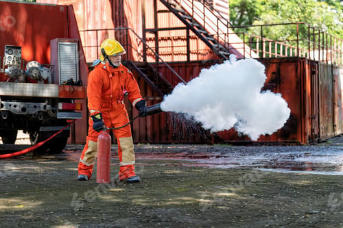 Preview: Fireman wearing fire protection suite and oxygen tank exercise hold extinguisher tank and pray
