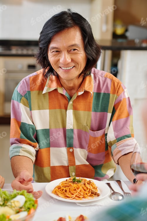 Preview: Man at festive dinner