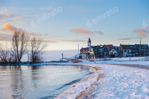 Preview: Lighthhouse of Urk Netherlands during sunset in the Netherlands