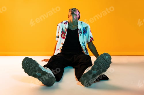 Preview: African man portrait in studio on colorful background