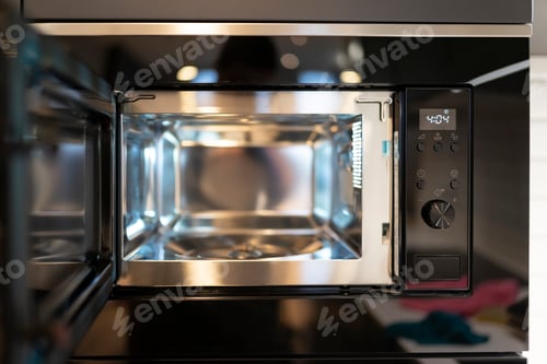 Preview: Modern built-in microwave microwave oven with open door. Empty microwave concept