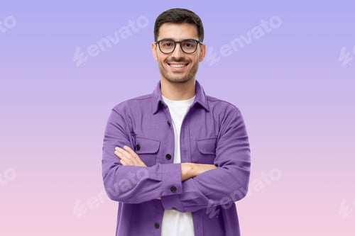 Preview: Portrait of young smiling confident latin man in purple shirt and glasses, isolated on purple