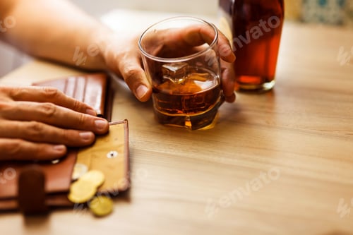 Preview: Fired man countsing his last money to drink expensive alcohol.